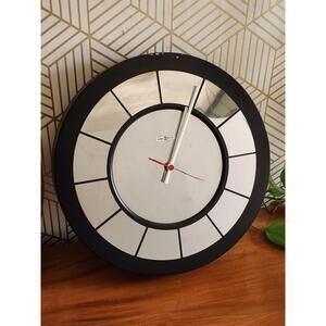 Vintage Howard Miller Mcm Modern Minimalist Black and Silver Mirror Wall Clock